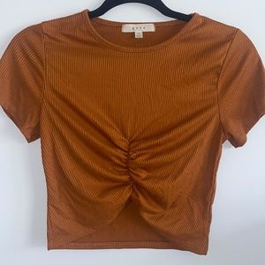 Rust colored short sleeve crop top